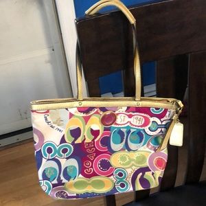 Multi colored coach bag.